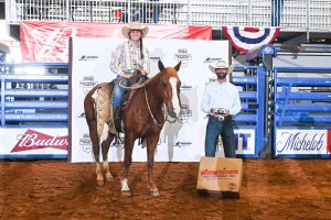 Gracie Bricker and Dual Looks win the Cowboy Class at the RHAA Natinoal Finals.